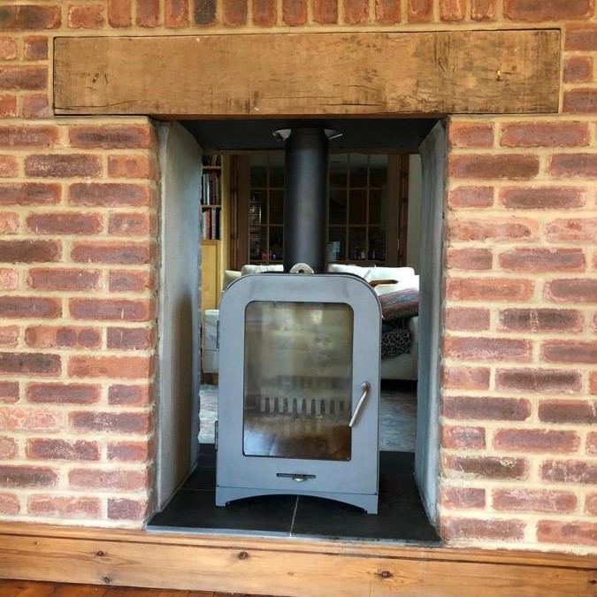 Vesta V8 Double Sided Wood Stove Installation